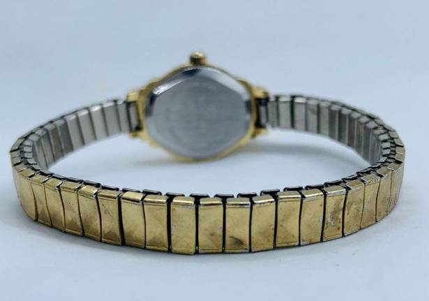 Ladies gold tone Quartz watch 19mm, stretch band size 7” fresh battery