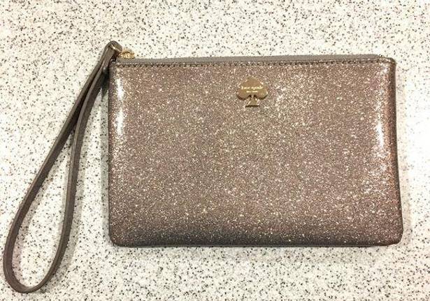 Kate Spade  patent leather silver glitter wristlet clutch