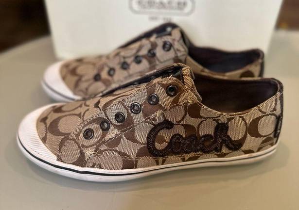 Coach  monogram slip on sneakers