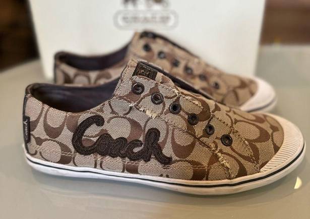 Coach  monogram slip on sneakers