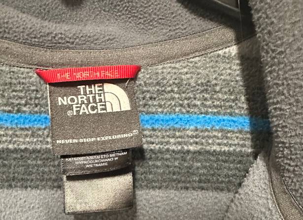 The North Face Striped Sweater is a Men’s size XL.