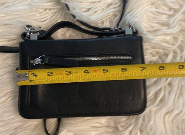 Madison West  Purse / wristband color black see all measurements and photos