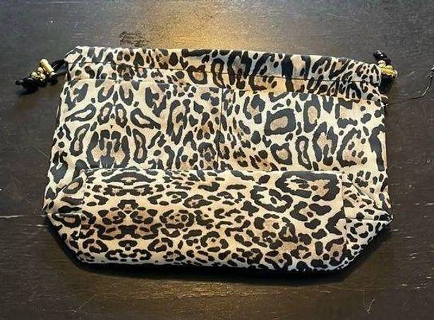 Chico's Chico travel bag in animal print. Brown/black. EUC. NWOT.