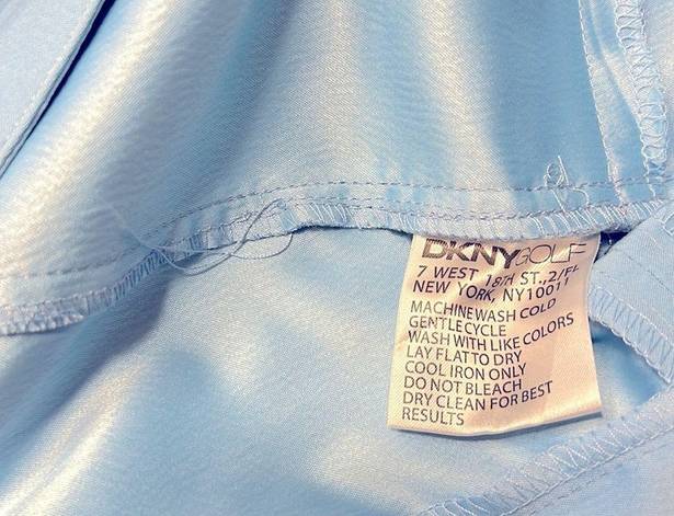 DKNY NWOT  GOLF BERMUDA SHORTS SKY BLUE WOMEN’S SIZE 12   3 Zip Pockets