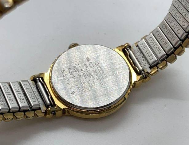 Seiko  ladies 7N82-0038 Quartz date watch 23mm gold tone white dial 7” running