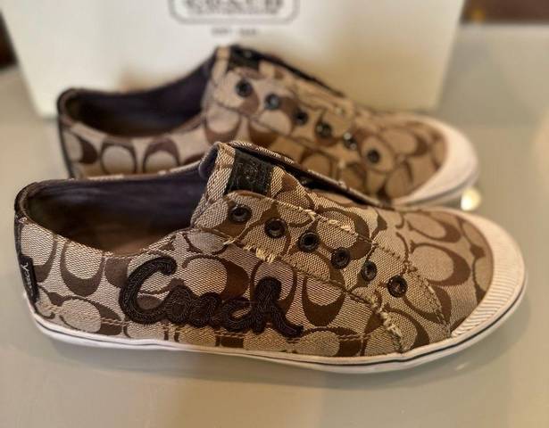 Coach  monogram slip on sneakers