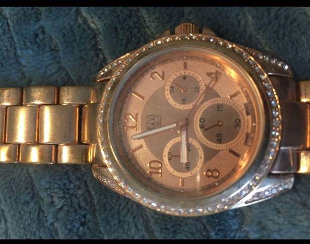Krass&co NY &  rose gold watch with rhinestones face
