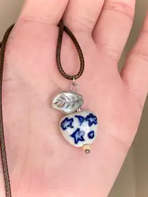 Handmade celestial porcelain heart bead & Czech leaf unique boho fairy whimsical necklace🌙🌀🌟