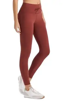 Vuori Women’s Daily high rise leggings in Spice rust color Size Medium