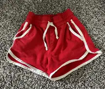 MOTHER the running mate retro track shorts red