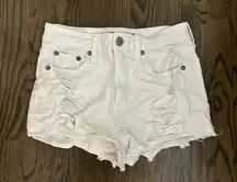 White ripped jean shorts