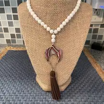 Marlyn Schiff milk glass leather tassel necklace