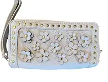Under One Sky Wristlet Ivory with leather flower cut outs