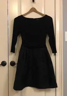 Women’s black formal dress.