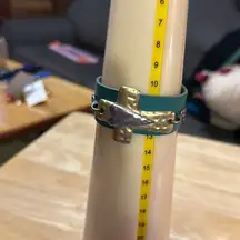 Adorable, leather bracelet with the cross in the heart in the middle​​