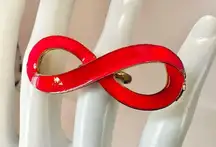 Pink and gold tone infinity ring