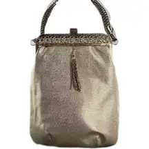 Vintage gold shimmering faux leather glam handbag with tassel.