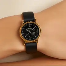 Gucci Unisex Black Watch with Gold Accents and Leather Strap