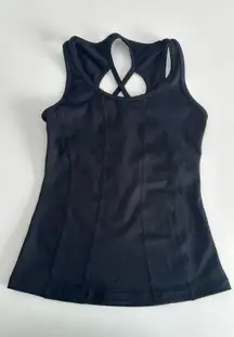 Capezio black tank top with cut out design on back. Size large child