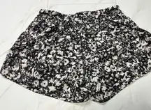 Lululemon Tracker Black & white Floral 4 in inseam shorts with built in brief 12