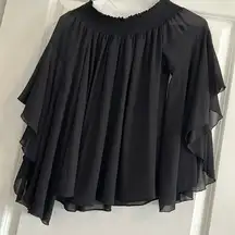 Ramy Brook size small sheer off-shoulder black top. Very cute!