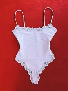 SKIMS fits everybody lace cami bodysuit in jupiter size M