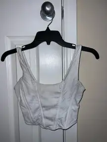 White corset top #corsetry  white, satin, fitted, structured, bustier, sleeveless, elegant, night-out, figure-flattering, minimalist’s