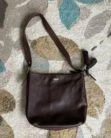 Vintage brown crossbody Coach bag with tassel detail