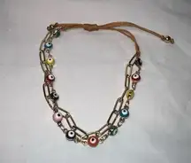 Gold Tone Paperclip and Evil Eye Bead Adjustable Bracelet