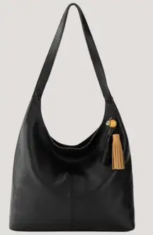 The Sak Huntley Leather Tote Black Tote Bag Tassel Accent Beige Interior Lining