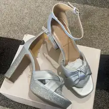 Silver soft knot platform heels. Sparkly heels
