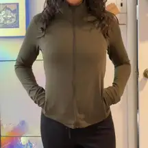 green uniqlo airism activewear jacket. size xs