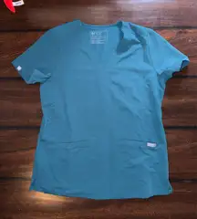 Figs dark teal scrub top two pockets 