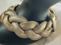 Wide flat herringbone braid gold tone bracelet