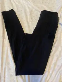 Fabletics black motion 365 leggings with pockets 