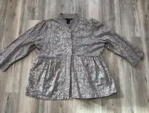 Sweatshirt Material size XL jacket, peplum bottom, w/light metallic design, pit to pit is 22, length is 25