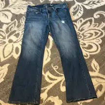 American Eagle stretch slim boot cut jeans. Excellent condition. Distressed.