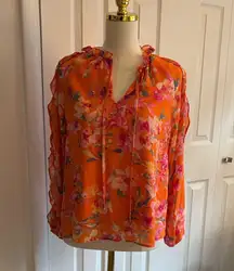 1. State floral top with semi cold shoulder.