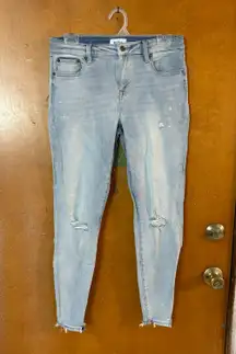 jeans.    Deconstructed distressing size 29