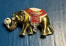 Vintage elephant pin brooch gold tone red white enamel rhinestones trunk up