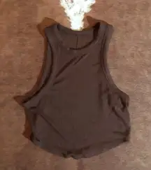 Lululemon hold me tight cropped tank top No size dot or rip top!  Best fits a 2 or 4 recommend for a small! no flaws 