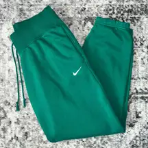 Nike Women's Phoenix Fleece Oversized Pant in Malachite/Sail