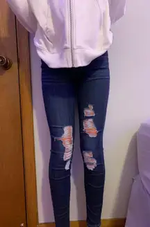 ripped blue skinny jeans