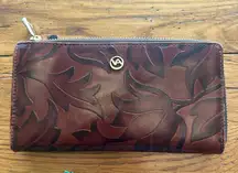 Valentina Embossed Leather Zip Around Wallet with a Leaf Motif Pattern in Brown