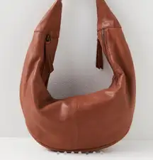 NWOT free people idle hands sling bag in brown Depth: 2.2in /Width: 15.7in 