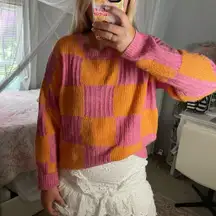 Pink Lilly, orange and pink checkered sweater