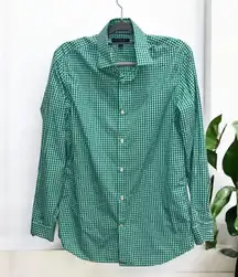 Long sleeve button up in a checkered print design.   100% cotton  Chest is 21” Length is 30”  Questions are Welcome Before Purchase Pet & Smoke Free Home Color Variation Due to Lighting Will Combine Shipping on Multiple Items Fast Shipping Happy Shopping ❤️ 