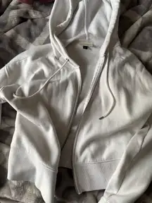 white zip up 