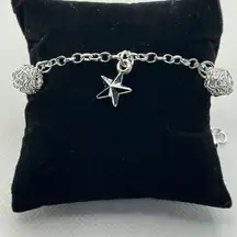 Brand New!! Sterling silver bracelet/anklet with stars and wire sphere/ball