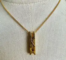 Gold tone clothes pin pendant necklace